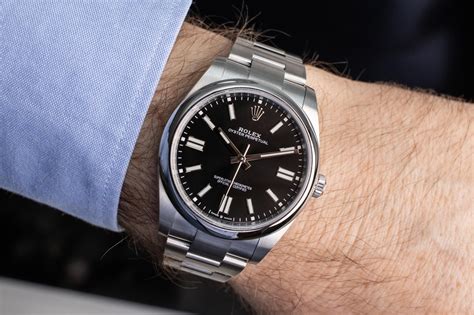 silver rolex with black dial